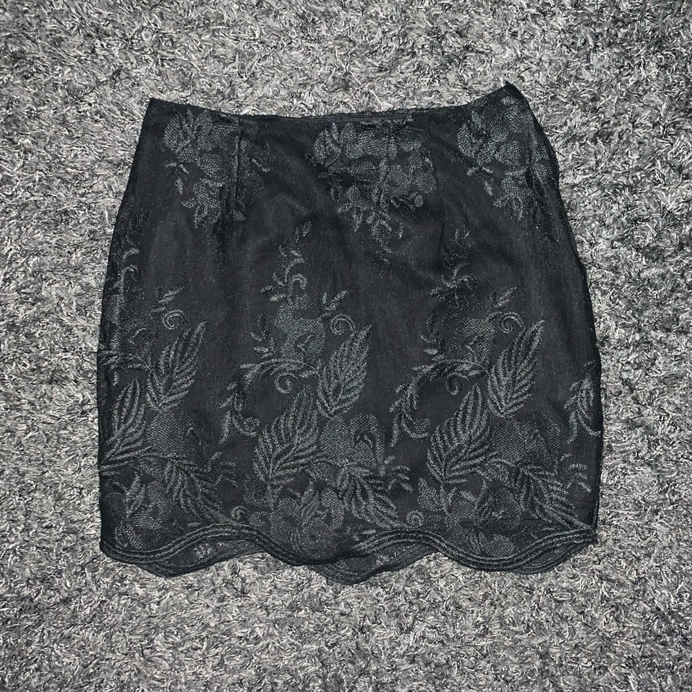 Black floral mini skirt